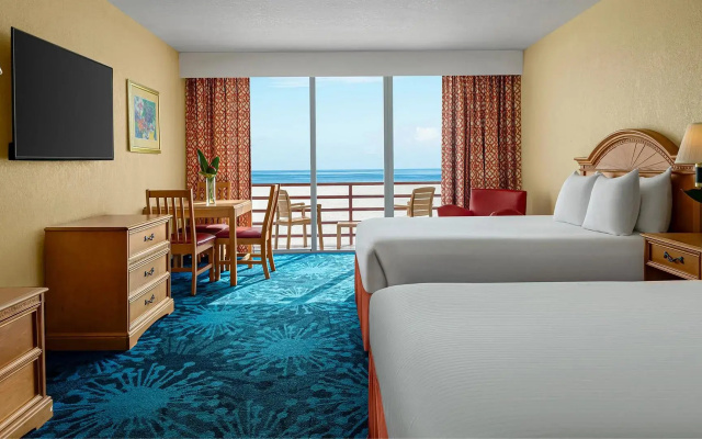 Quadruple room with balcony and beachfront