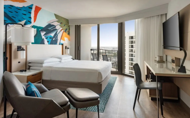 Room with balcony and with city view