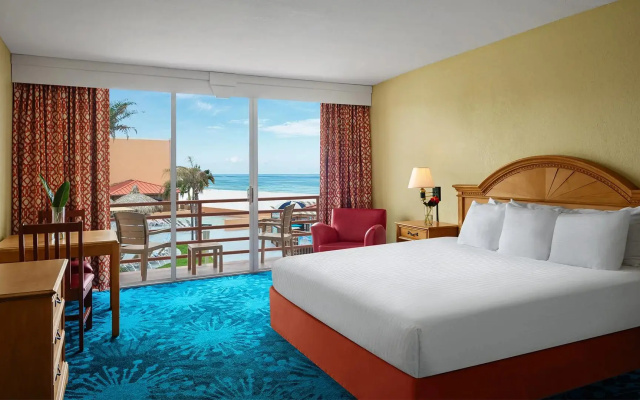 Room with balcony and with pool view