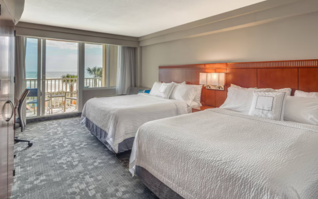 Quadruple room with balcony and oceanfront