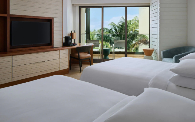 Twin room with partial ocean view