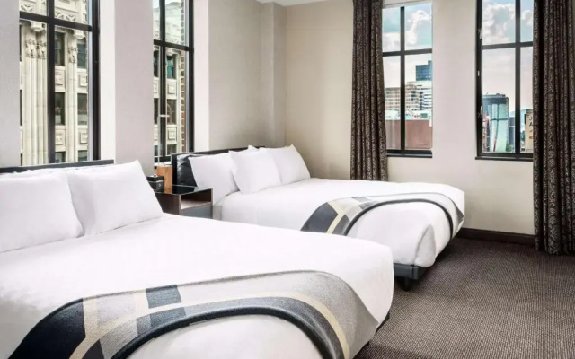 Deluxe Mobility Accessible with Roll-In Shower Quadruple room