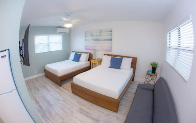 Quadruple Studio Suite with pool view