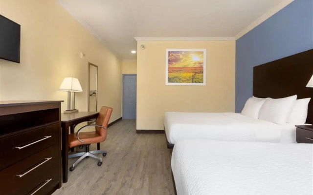 photo 2 of Days Inn & Suites by Wyndham DFW Airport South-Euless