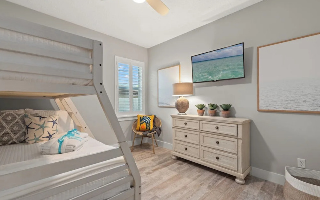 photo 5 of Charming 3/2 Beach House w/ Pool & Golf Cart Included - 1 Min Walk to Beach