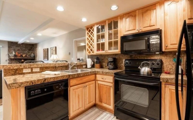 photo 4 of Condo with Outdoor Heated Pool and Free WiFi by RedAwning