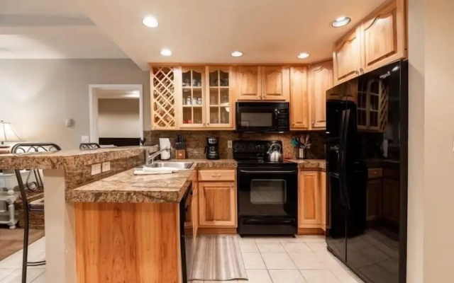 photo 5 of Condo with Outdoor Heated Pool and Free WiFi by RedAwning