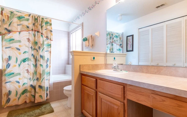 photo 4 of 3 Bedroom Home With Private Screened Pool With Rock Waterfall Feature and Gameroom by Florida Dream Homes