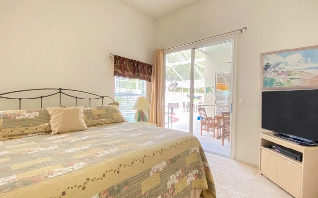 photo 5 of 3 Bedroom Home With Private Screened Pool With Rock Waterfall Feature and Gameroom by Florida Dream Homes