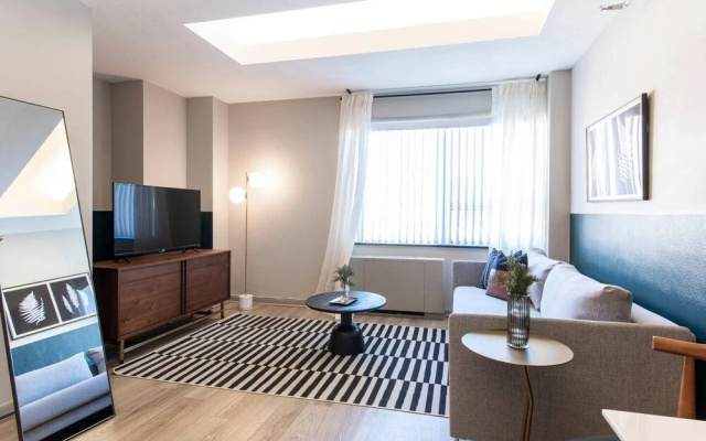 photo 2 of Abode Vue at 3rd 1-bedroom Loft Style Suite