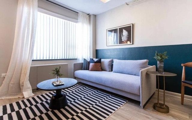 photo 2 of Abode Vue at 3rd 1-bedroom Loft Style Suite