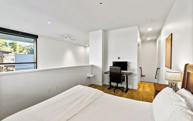 photo 4 of Airy and Open Corner Loft - 92 Walkscore