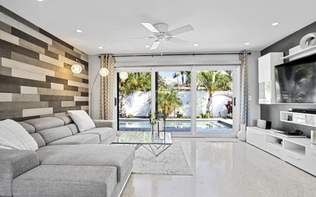 photo 4 of Beach Bliss 10 Mins to Waves 3BR Oasis With Pool
