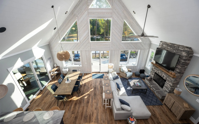photo 2 of Luxe Lakefront Lodge w/ Pool, Hot Tub, Theater & Private Dock Sleeps 21