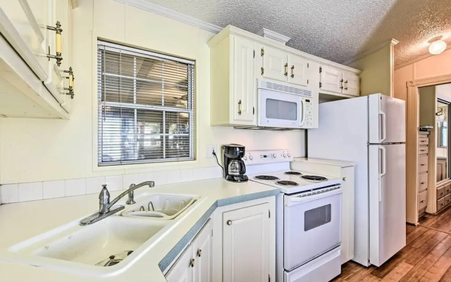 photo 4 of Bright Home: Pool Access & Screened-in Porch!