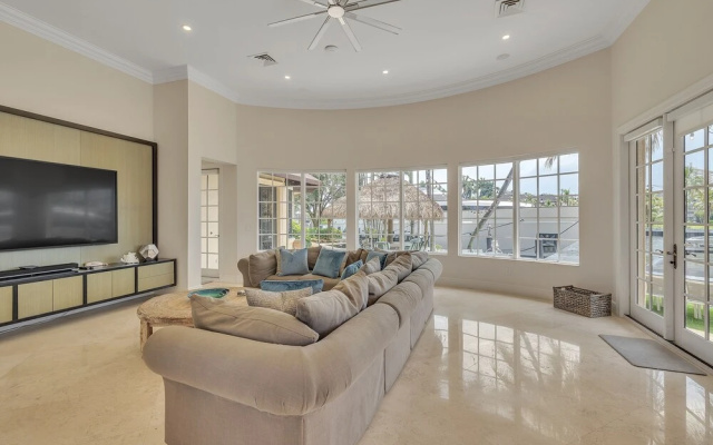 photo 2 of Casa Royale - Luxurious Waterfront Living 7 Bedroom Home by RedAwning