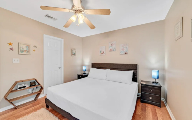 photo 3 of Charming Condo With Luxe Amenities Less Than 10 Minutes From the Beach
