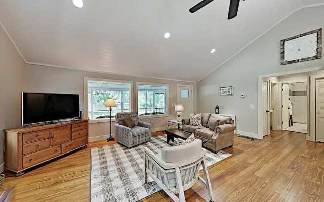 photo 4 of Charming Getaway W/ Luxe Interior & Screened Patio 2 Bedroom Cottage