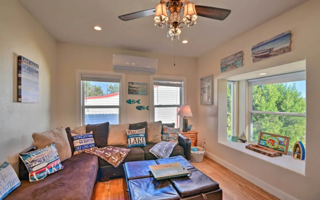 photo 2 of Steps to Lake! Charming Cabin: Pool Access & Decks