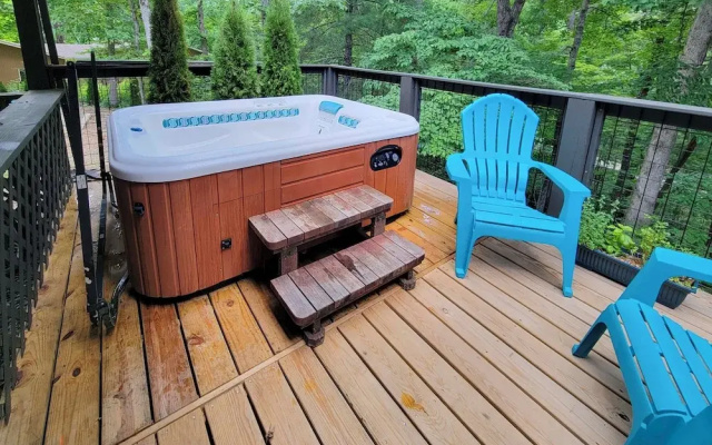 photo 5 of Unwind Fireside: Serene Murphy Escape w/ Hot Tub!