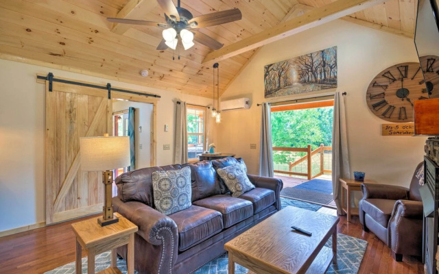 photo 3 of Deck & Hot Tub: Bryson City Riverfront Cabin!