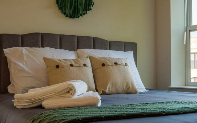 photo 3 of Chic Central Apartment with Free Parking