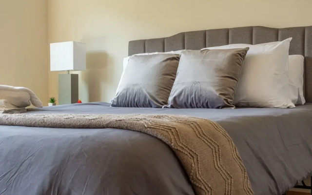photo 5 of Chic Central Apartment with Free Parking