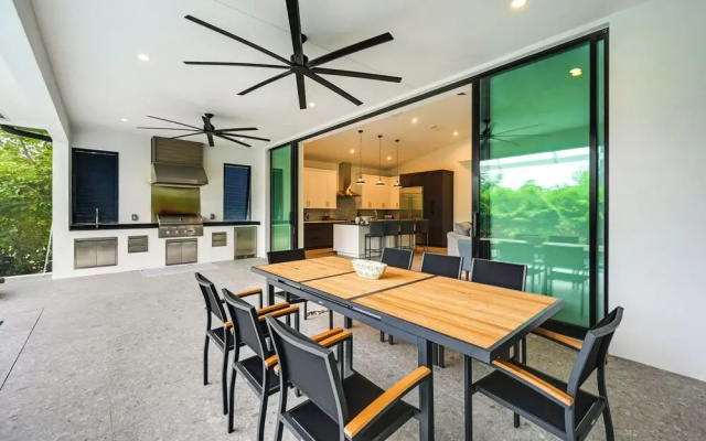 photo 5 of Contemporary Naples Home w/ Outdoor Kitchen & Pool