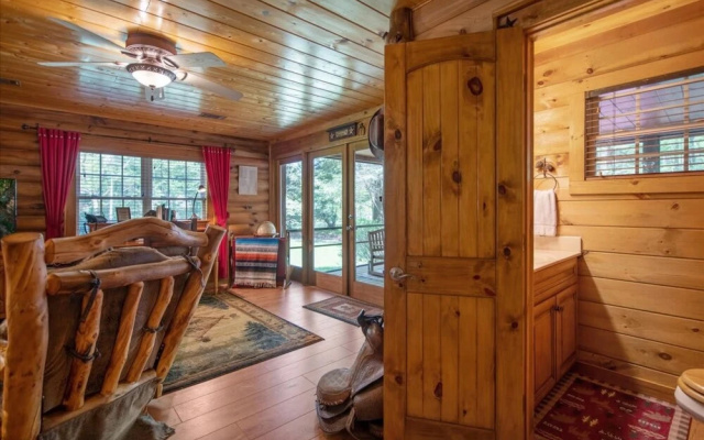 photo 2 of Cowboy Cabin - Gorgeous Unique Mountain Cabin With Creek Porch Pool Table
