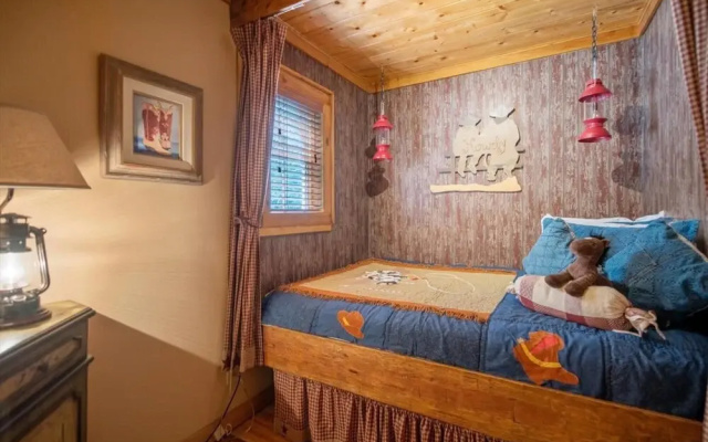 photo 4 of Cowboy Cabin - Gorgeous Unique Mountain Cabin With Creek Porch Pool Table