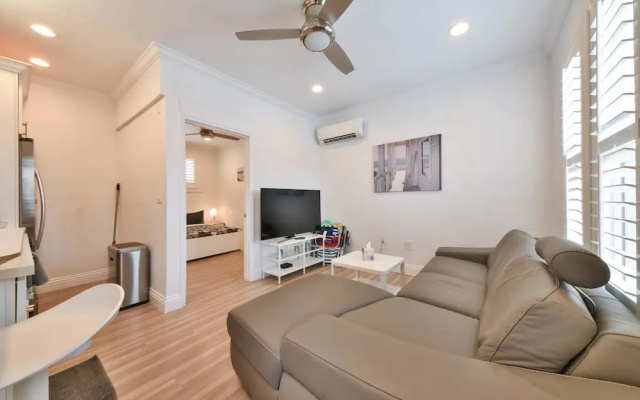 photo 4 of A4 Cozy Modern Beach Home With AC Steps From the Beach and Bay