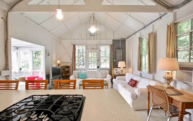 photo 4 of Cozy Stockbridge Cabin - Walk to Beach & Lake!