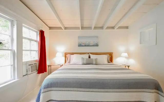 photo 5 of Cozy Stockbridge Cabin - Walk to Beach & Lake!