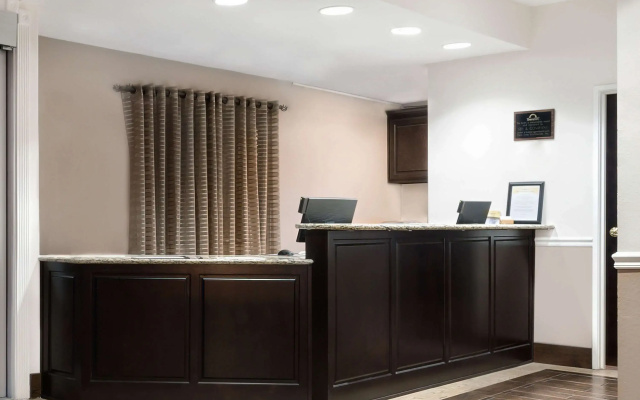 photo 2 of Days Inn & Suites by Wyndham Dallas