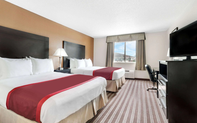 photo 4 of Days Inn & Suites by Wyndham Dallas