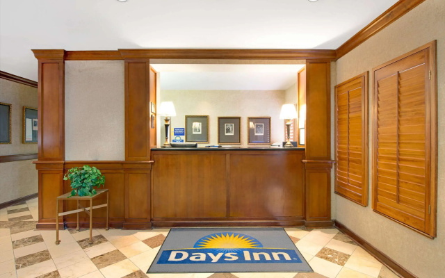 photo 2 of Days Inn and Suites by Wyndham St. Louis/Westport Plaza