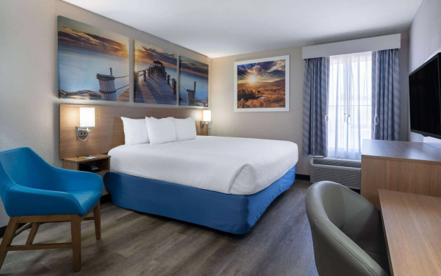 photo 5 of Days Inn & Suites by Wyndham Commerce
