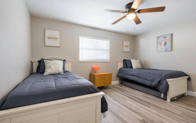 photo 4 of Elegant Heated Pool Home 12 minutes to the beaches of Anna Maria Island and IMG Academy