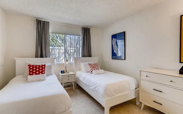 photo 2 of Escape At The Beach - Near Ritz Carlton - Private Entrance - 2BR - Fast WIFI - Free Parking! (MB2)