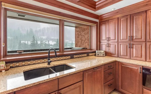 photo 3 of Exclusive 4 Bedroom Ski in, Ski out Vacation Rental With Hot Tubs and Heated Outdoor Pool in Lionshead Village
