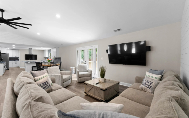 photo 3 of Lakefront Retreat With Private Dock, Pool, Game Room Sleeps 18