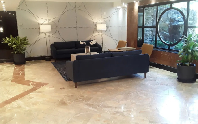 photo 2 of Garden Inn & Suites