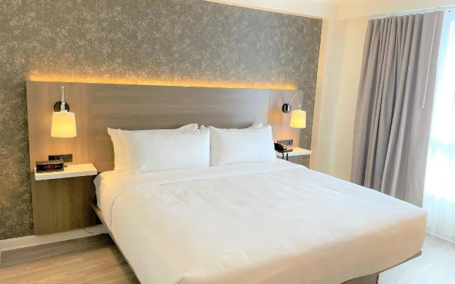 photo 3 of Garden Inn & Suites
