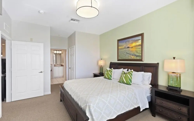 photo 2 of Genoa Vacation Rental: Stylish 2-BR Condo with Golf & Lake Views. Resort-Style Pool, Hot Tub, and Easy Access to Championship Golf. Minutes from Naples Beaches, 5th Avenue S, and Marco Island