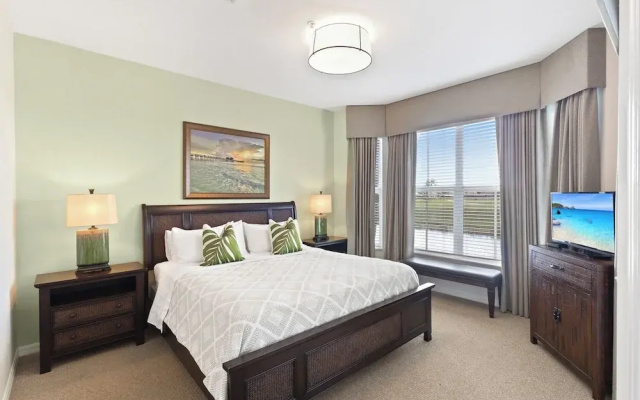 photo 3 of Genoa Vacation Rental: Stylish 2-BR Condo with Golf & Lake Views. Resort-Style Pool, Hot Tub, and Easy Access to Championship Golf. Minutes from Naples Beaches, 5th Avenue S, and Marco Island