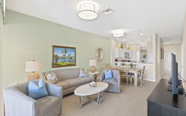 photo 4 of Genoa Vacation Rental: Stylish 2-BR Condo with Golf & Lake Views. Resort-Style Pool, Hot Tub, and Easy Access to Championship Golf. Minutes from Naples Beaches, 5th Avenue S, and Marco Island