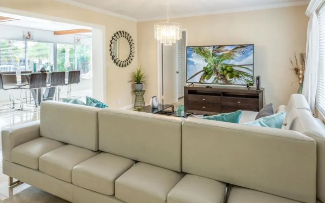 photo 2 of Gorgeous Canal W/ Private Pool & Dock 3 Bedroom Home