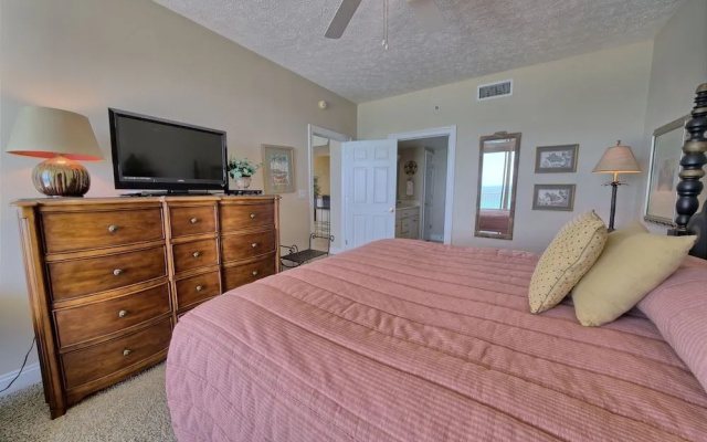 photo 4 of Tropical Gulf Front Condo with Picnic Area & Grills - Unit 0802 by RedAwning