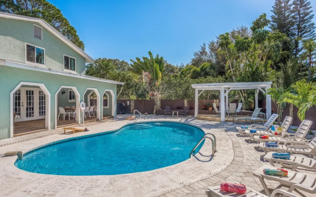 photo 4 of Great 6BR for All Ages/Heated Pool 5 Min to Beach by RedAwning