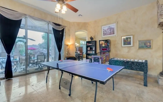 photo 2 of Immense Chandler 5 Bedroom Home Sleeps 10 Comfortably! Game Room Putting Green, Heated Pool and Spa. by RedAwning
